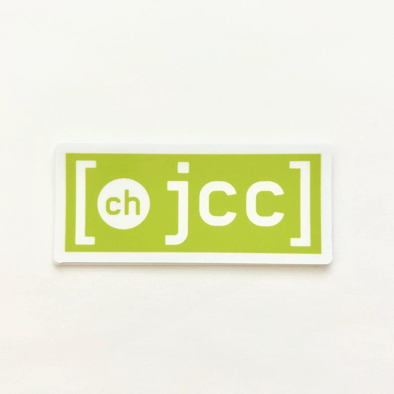 May include: A rectangular sticker with a white border and a light green background. The sticker features the letters "jcc" in white, with "ch" in a white circle. The text is enclosed in white brackets.