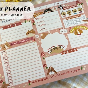 May include: A pink daily planner with a cute dog illustration on the cover. The planner is 8.5 inches by 11 inches and has 50 pages. It includes sections for to-do lists, time schedules, meal plans, brain dumps, notes, and water intake tracking. The planner also features a section for "Today's Mood" and "For Tomorrow".