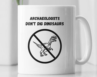 Zabawny kubek archeologiczny: Archeolodzy nie kopią dinozaurów