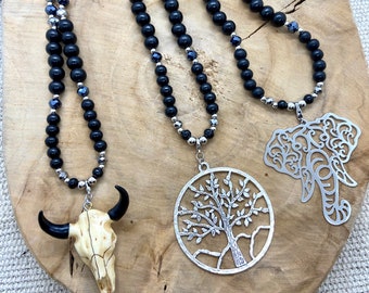 Collection of black wooden necklaces with touches of boho chic silver rhinestones