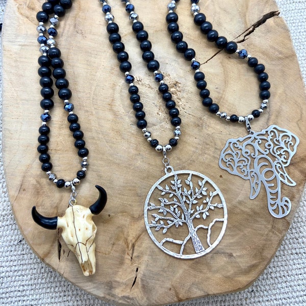 Collection of black wooden necklaces with touches of boho chic silver rhinestones