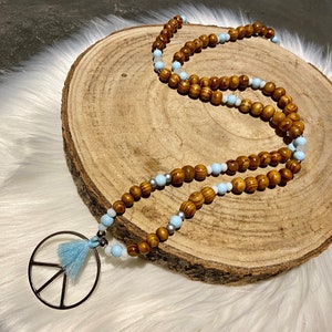 Hippie-Chic-Halskette aus Holz mit Peace-Anhänger