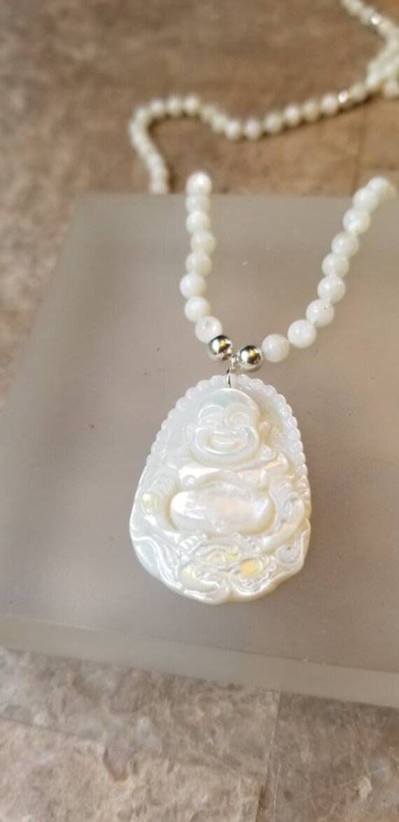 Mother of Pearl Laughing Buddha Pendant Mother of Pearl Laughing Buddha Pendant