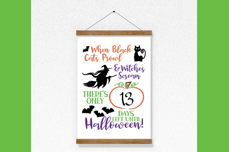 May include: A white sign with a black cat, witch, and bats. The sign says "When black cats prowl & witches scream there's only 13 days left until Halloween!"