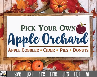 Puede incluir: Un letrero de madera con el texto "PICK YOUR OWN Apple Orchard" en letras verdes y azules. Debajo del texto hay una línea marrón y las palabras "APPLE COBBLER CIDER PIES DONUTS" en letras marrones.