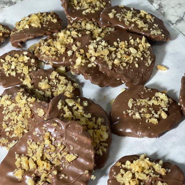 Chocolate covered potato chips, packaged in 2 half pound bags to equal 1 lb of chips,  made fresh per order.