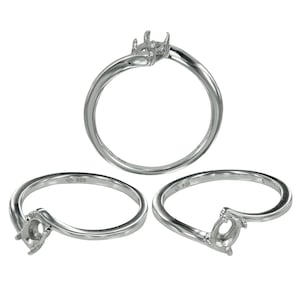 May include: Three silver rings with a curved design. Each ring has a setting for a gemstone. The rings are made of a shiny, metallic material and are displayed against a white background. The rings are marked with "925".