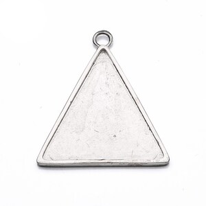 May include: Silver triangle pendant with a loop at the top for attaching a chain or cord.