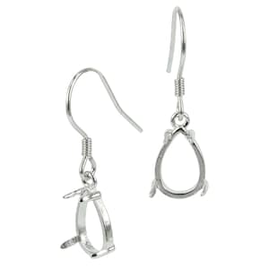 May include: Two silver earring findings. Each earring has a teardrop-shaped bezel setting and a hook. The findings are designed for jewellery making and feature a simple, elegant design.