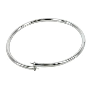 May include: A silver bangle bracelet with a hinged opening.