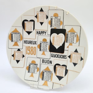 Piero Fornasetti Milano 1980 vintage zwart en goud keramisch kalenderbord