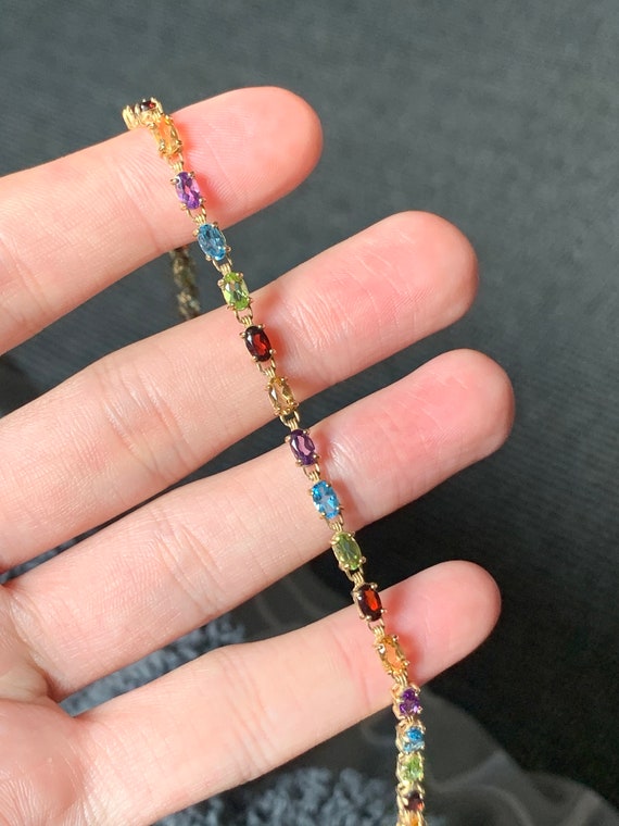 Stunning 9ct gold multi gemstone bracelet