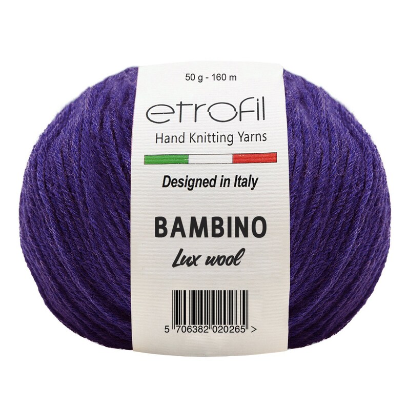 May include: A skein of purple yarn labeled "etrofil" Hand Knitting Yarns, "Designed in Italy", "BAMBINO Lux wool", and a barcode. The skein is 50 grams and 160 meters.