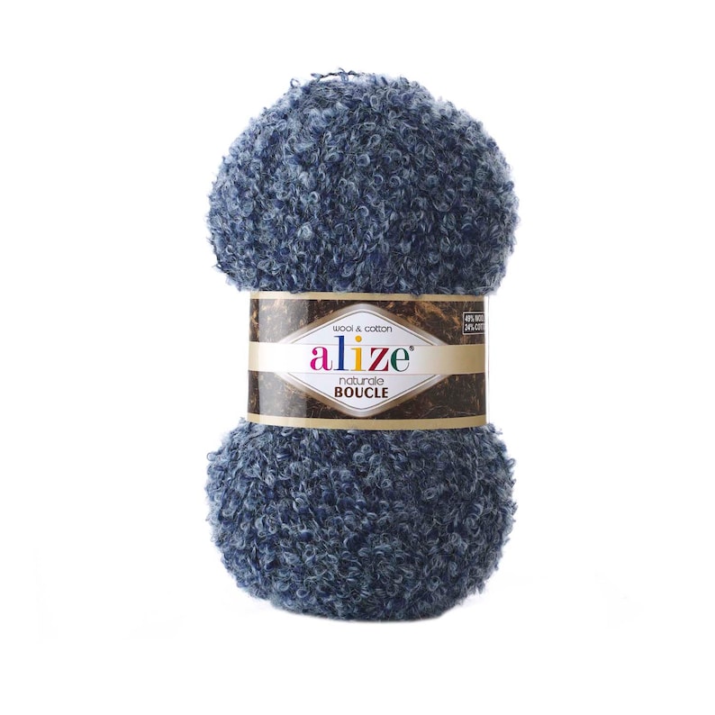 Puede incluir: Un ovillo de lana azul con una etiqueta que dice "alize' naturals BOUCLE" y "wool & cotton".