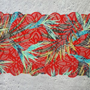 May include: Red lace trim with a tropical leaf pattern in shades of green, blue, and yellow.