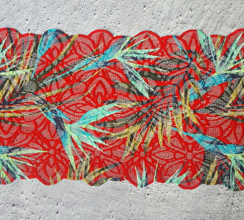 May include: Red lace trim with a tropical leaf pattern in shades of green, blue, and yellow.