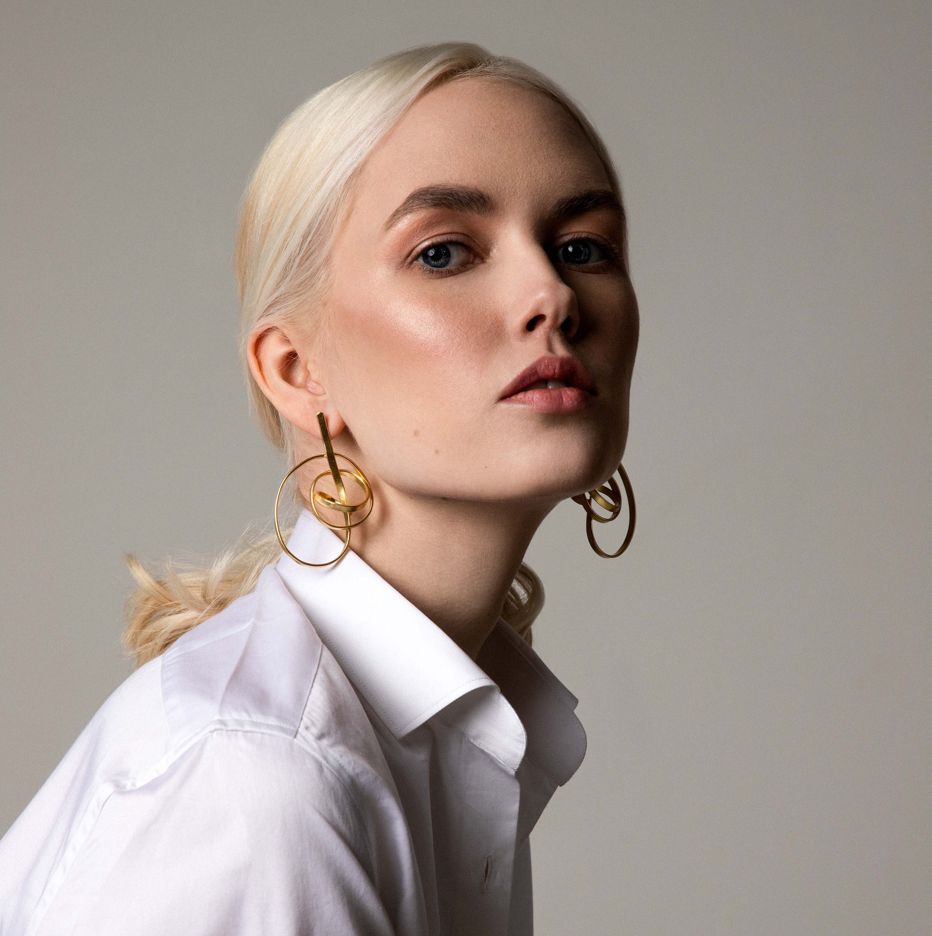 Contemporary gold shop earrings