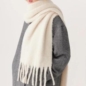 Ivory Cozy and Warm checkered brushed scarf with fringe accent