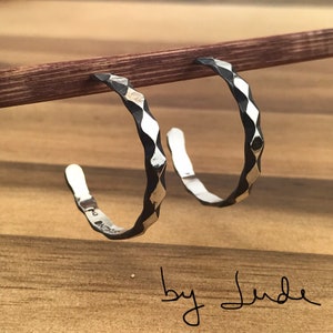 Sterling silver hoops; one inch diameter; diamond patterned