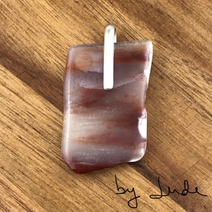Arizona rainbow petrified pendant with sterling silver bail. Your choice of leather cord, silver-plated chain, or sterling silver chain.