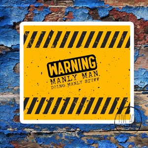 May include: Yellow warning sign with black stripes and the text "WARNING MANLY MAN. DOING MANLY STUFF."