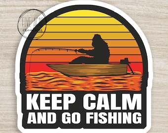 May include: A sticker with a retro sunset design featuring a silhouette of a Bigfoot fishing from a boat. The text "Keep Calm and Go Fishing" is printed below the image.