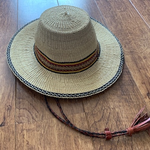 KUKUVI, African handwoven straw Bucket hat with wide trim and adjustable strap