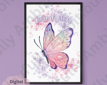 May include: A framed art print featuring a watercolor butterfly with pink, purple, and blue hues. The butterfly is set against a backdrop of soft, abstract splashes of color. The words "Born To Soar" are written above the butterfly.