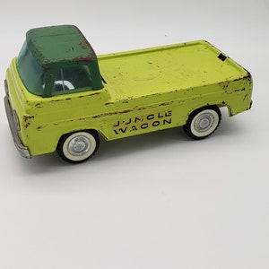 1960’s Vintage Nylint Econoline Jungle Wagon Pressed Steel Toy Truck