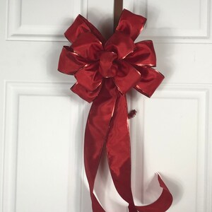 Red ribbon, red bow, support bow, health care support, prayer bow