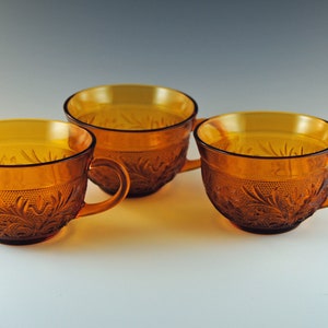 Three coffee cups, Sandwich Desert Gold, Anchor Hocking, 1961 to 1964