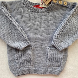 Children&#39;s sweater size 74/80 in light blue made of pure new wool with alpaca hand-knitted