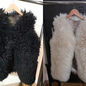Lot of 2. natural sheep vest.  Black  and  white.