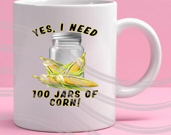May include: White ceramic mug with a black and yellow graphic that says "YES, I NEED 100 JARS OF CORN!"  The graphic also includes a glass jar with corn cobs inside.