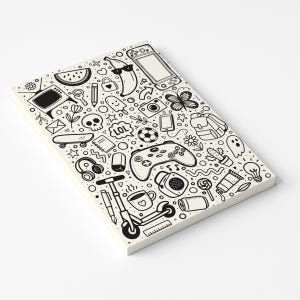May include: A white notepad with a black doodle design featuring a variety of illustrations. The drawings include a banana wearing sunglasses, a video game controller, a skull, and a skateboard.