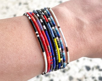 Layering thin bracelet made with delica miyuki glass beads. Everyday minimalist stacking friendship bracelets.