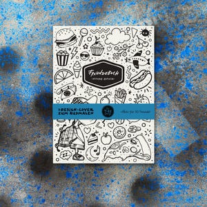 May include: A white journal with a black and white doodle design featuring food and other objects. The cover includes the text "FREUNDEBUCH -streng geheia-" and ">DESIGN-COVER ZUM AUSMALEN" with a blue band that says "7-12".