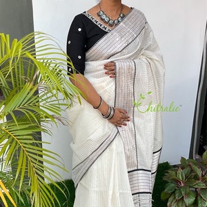 Karthumpi- Pure Balaramapuram Handloom Black And Silver Jerry Lined Premium Quality Kasavu Saree