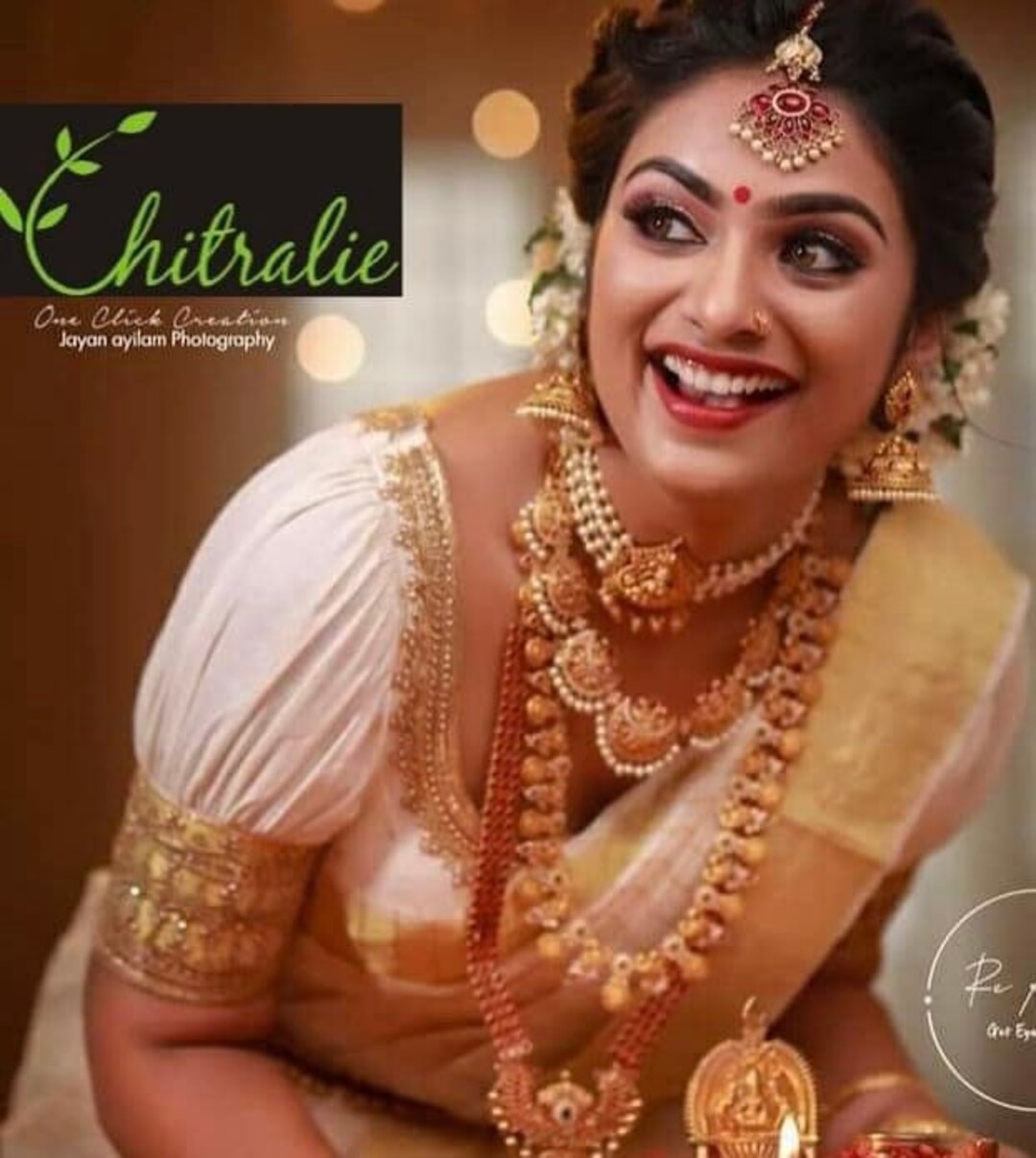 Ivory and Gold Kerala Handloom Kasavu Blouse With Aari Work