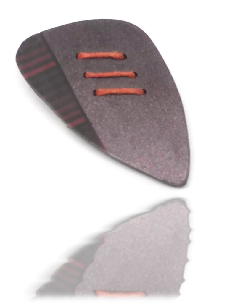 Plum irrisee red and black graphic pin