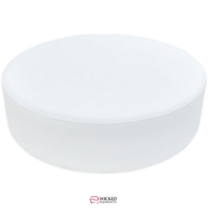 A large, round, upholstered ottoman bench with a smooth, flat top, designed as a centerpiece or additional seating. The ottoman is shown in a sleek, white leatherette fabric and rests on small, discreet feet. It measures approximately 54 inches in diameter and 17 inches in height.