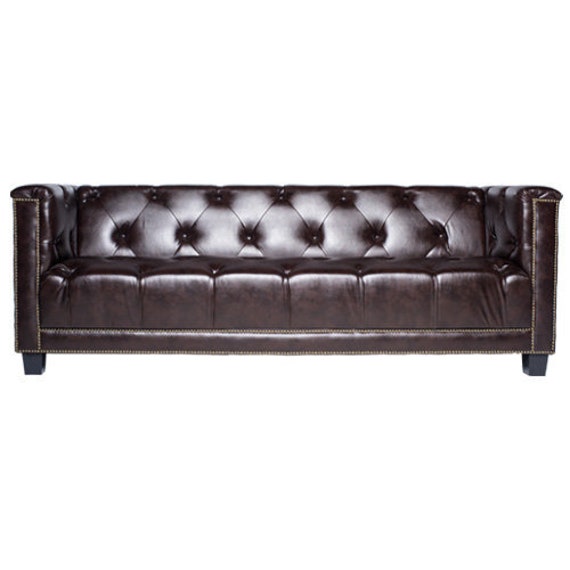 Tufted sofa with nailhead trim deals