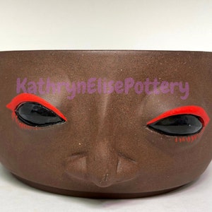 Handmade face planter black eyes