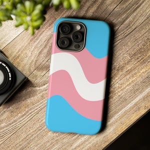 May include: A phone case featuring a blue, pink and white wavy design. The case has a camera cutout and is designed for a smartphone.