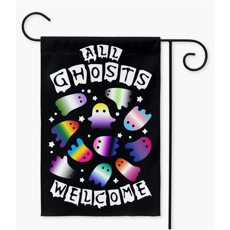 May include: A black garden flag with the text "All Ghosts Welcome" in white dripping letters. The flag features a circle of colorful ghosts with different pride flag colors.