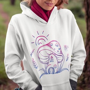 May include: White hoodie with a pink and blue graphic of a mushroom house with a sun and flowers.