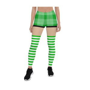May include: Green and white plaid shorts with a black waistband and green and white striped leggings.