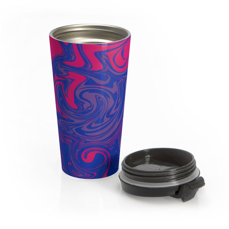 May include: A stainless steel travel mug with a blue and pink swirl pattern. The mug has a black lid with a flip top.