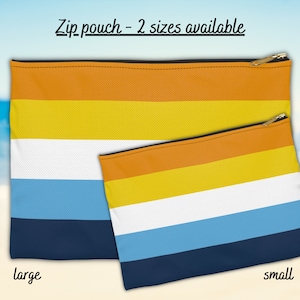 May include: Two zippered pouches with a striped design in orange, yellow, white, blue, and navy blue. The larger pouch is labeled "large" and the smaller pouch is labeled "small". Zip pouch - 2 sizes available.