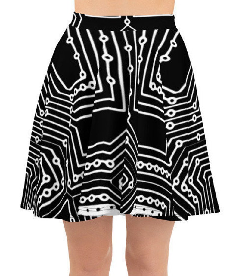 May include: Black and white skater skirt with a circuit board pattern.